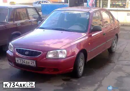 Фото автомобиля TAGAZ ACCENT, 2005 — госномер М270АХ35. Цвет: Красный