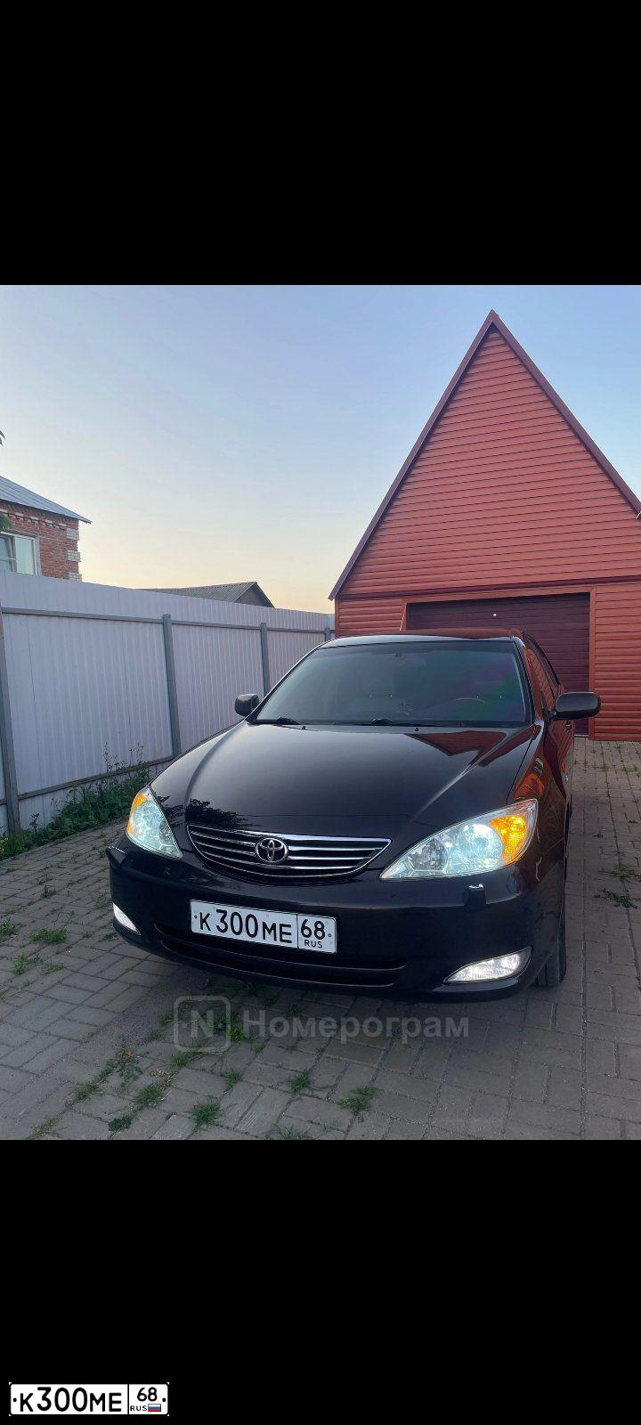 Фото автомобиля TOYOTA CAMRY, 2003 — госномер Р957МР68. Цвет: Коричневый