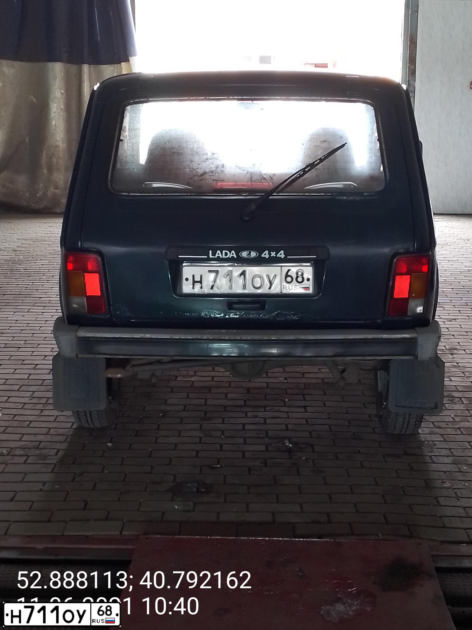 Фото автомобиля LADA 2121 NIVA, 2007 — госномер К094КХ68. Цвет: ТЕМНО-ЗЕЛЕНЫЙ