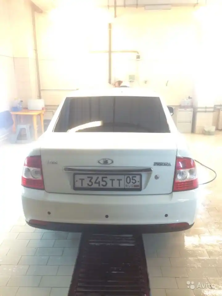 Фото автомобиля LADA 2170 PRIORA, 2014 — госномер Т345ТТ05. Цвет: БЕЛЫЙ