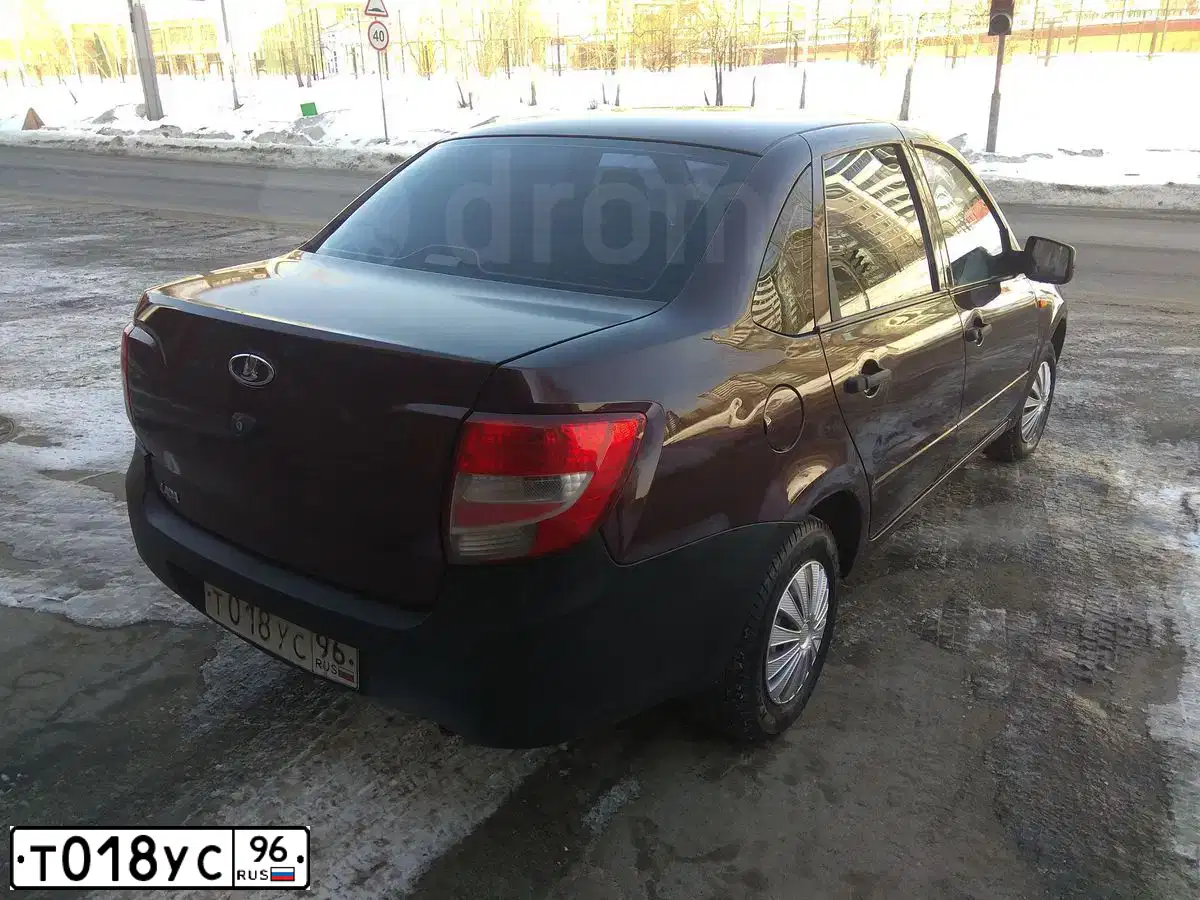 Фото автомобиля LADA 2190 GRANTA, 2012 — госномер Н828КМ102. Цвет: ТЕМНО-ВИШНЕВЫЙ