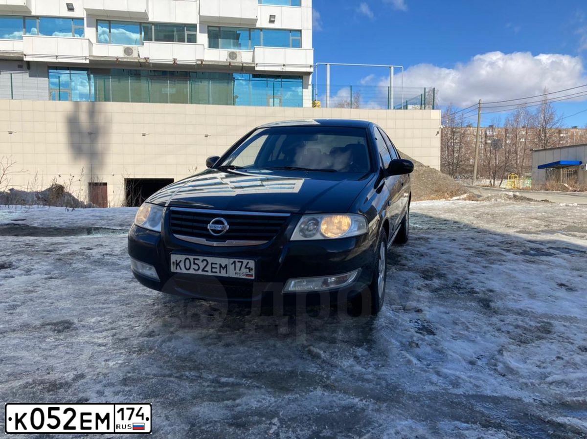 Фото автомобиля NISSAN ALMERA, 2008 — госномер К052ЕМ174. Цвет: ЧЕРНЫЙ