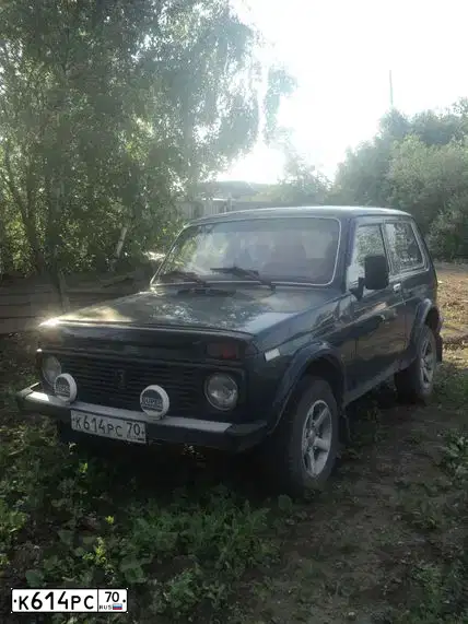 Фото автомобиля LADA 2121 NIVA, 2001 — госномер С292НА70. Цвет: Сине-зеленый