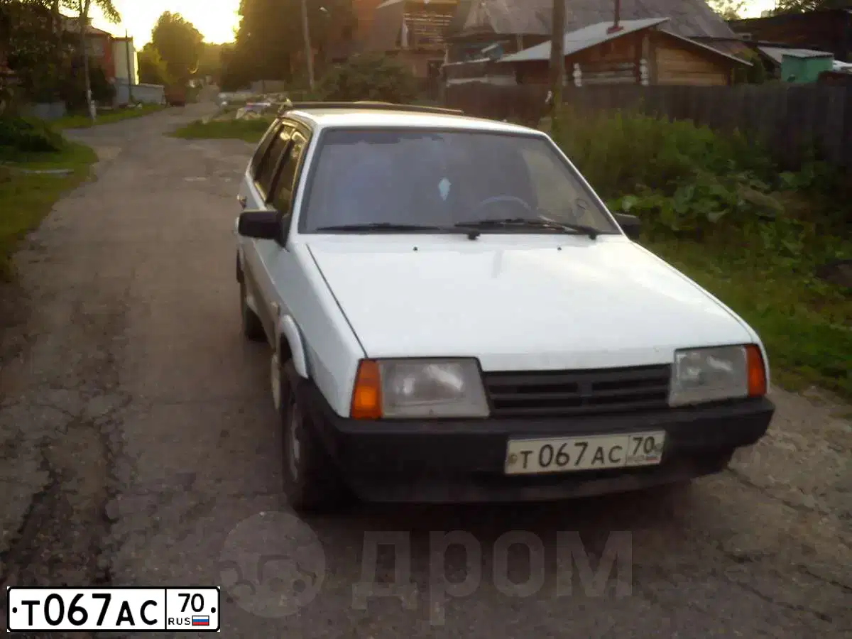 Фото автомобиля RENAULT KANGOO, 2007 — госномер Т067АС70. Цвет: БЕЛЫЙ