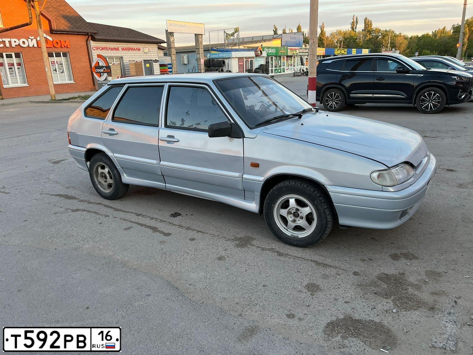 Фото автомобиля LADA 2114 SAMARA, 2004 — госномер Т592РВ16. Цвет: Серебристо-Желтый