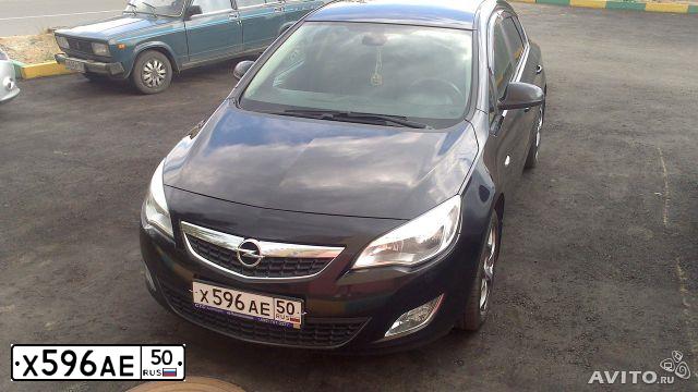 Фото автомобиля OPEL ASTRA, 2010 — госномер Е619ЕС136. Цвет: ЧЕРНЫЙ