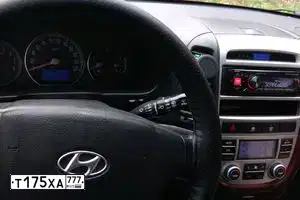 Фото автомобиля HYUNDAI SANTA FE, 2006 — госномер К871ОВ136. Цвет: ВИШНЕВЫЙ ТЕМНЫЙ