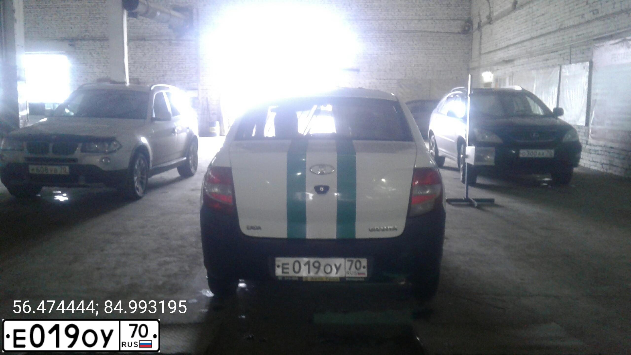 Фото автомобиля LADA 2190 GRANTA, 2012 — госномер Е019ОУ70. Цвет: БЕЛЫЙ