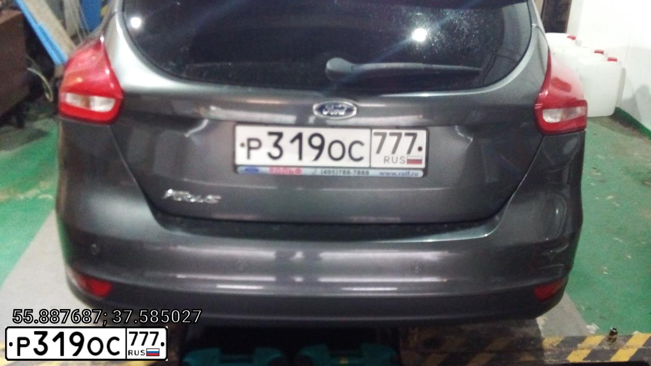 Фото автомобиля FORD FOCUS, 2015 — госномер Р319ОС777. Цвет: Серый