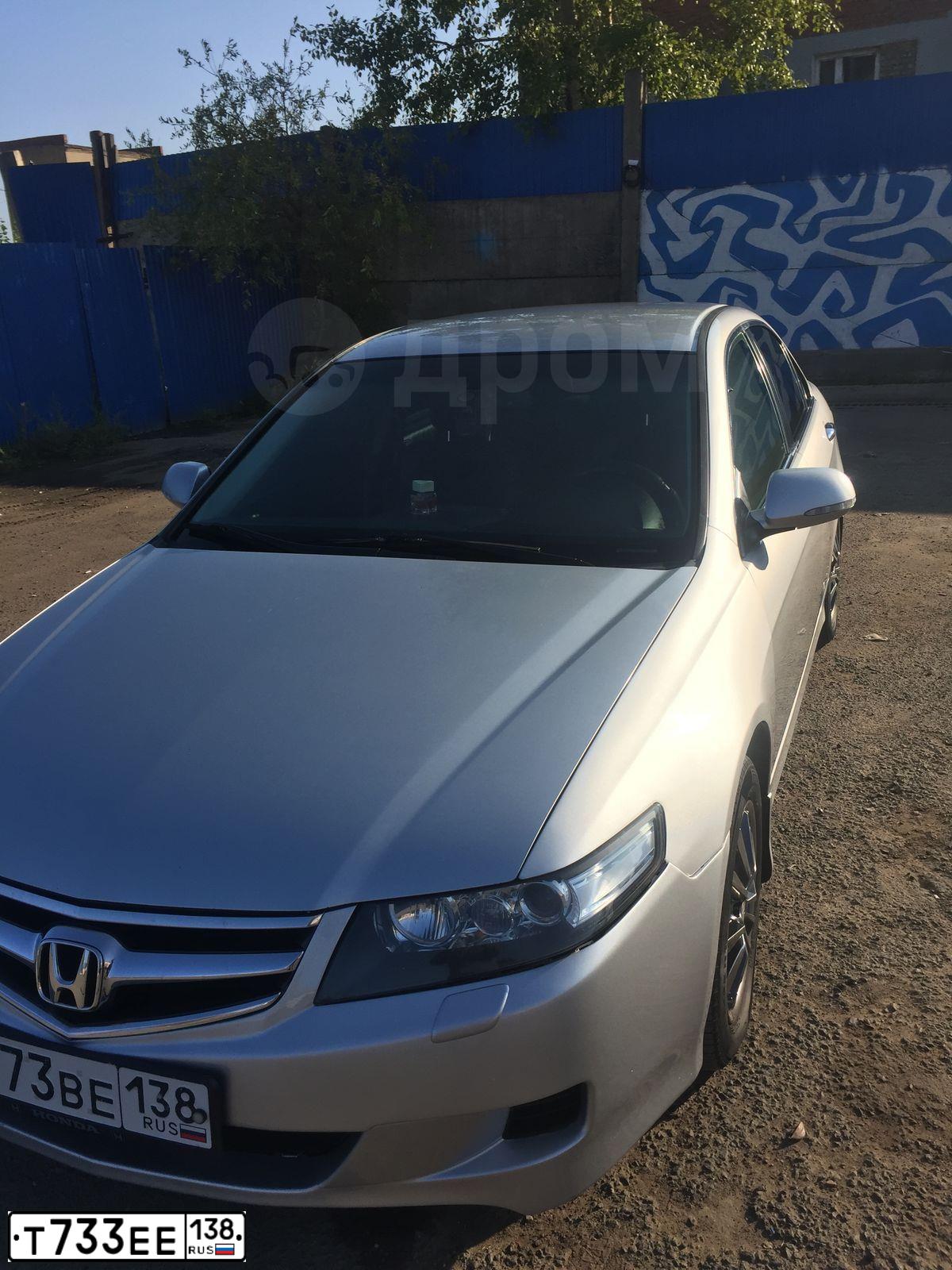 Фото автомобиля VOLKSWAGEN GOLF, 2011 — госномер Т733ЕЕ138. Цвет: СЕРО-КОРИЧНЕВЫЙ