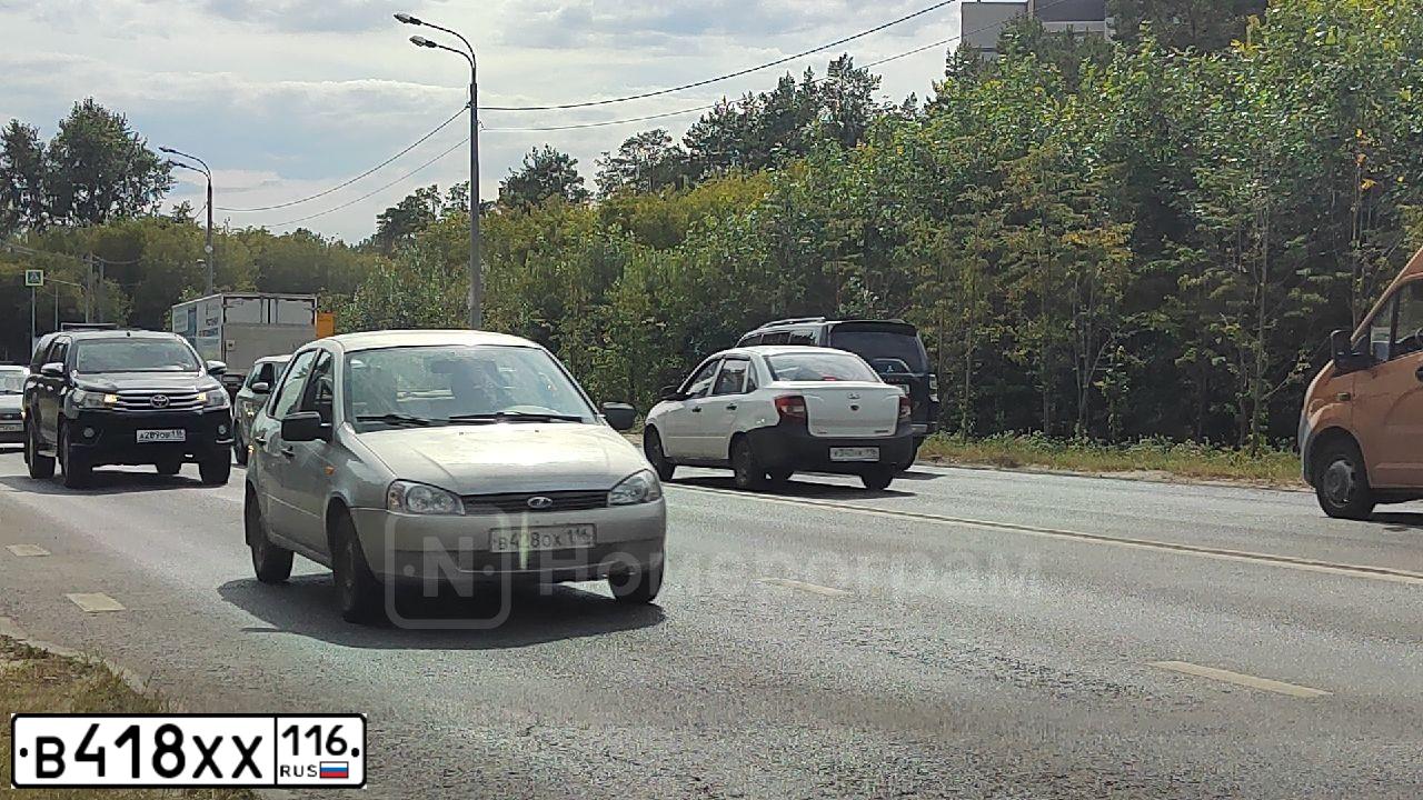 Фото автомобиля VOLKSWAGEN TOURAN, 2005 — госномер Н025ХО73. Цвет: ЧЕРНЫЙ