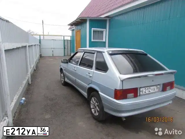 Фото автомобиля LADA 2114, 2005 — госномер Е212КА36. Цвет: СЕРЕБРИСТО-ЖЕЛТО-ГОЛУБОЙ