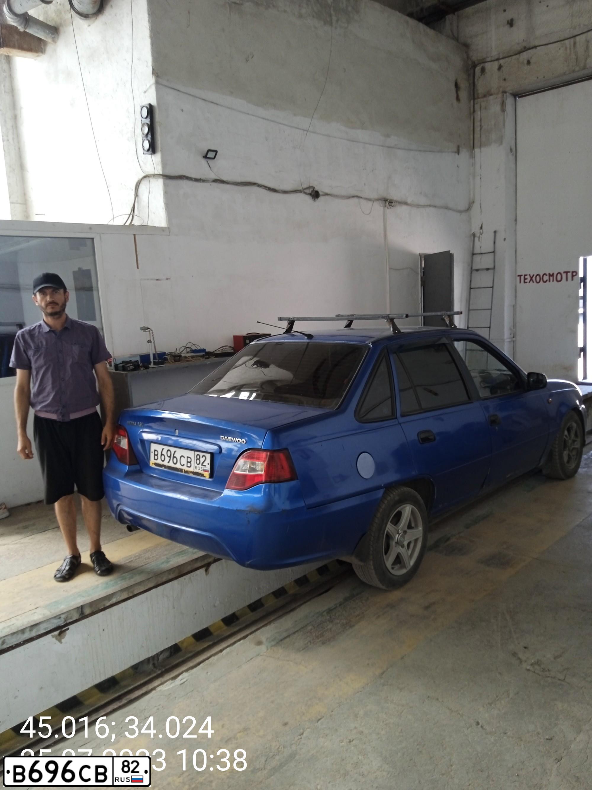 Фото автомобиля DAEWOO NEXIA, 2010 — госномер Н310КР82. Цвет: СИНЕ-ГЛАЗУРИСТЫЙ