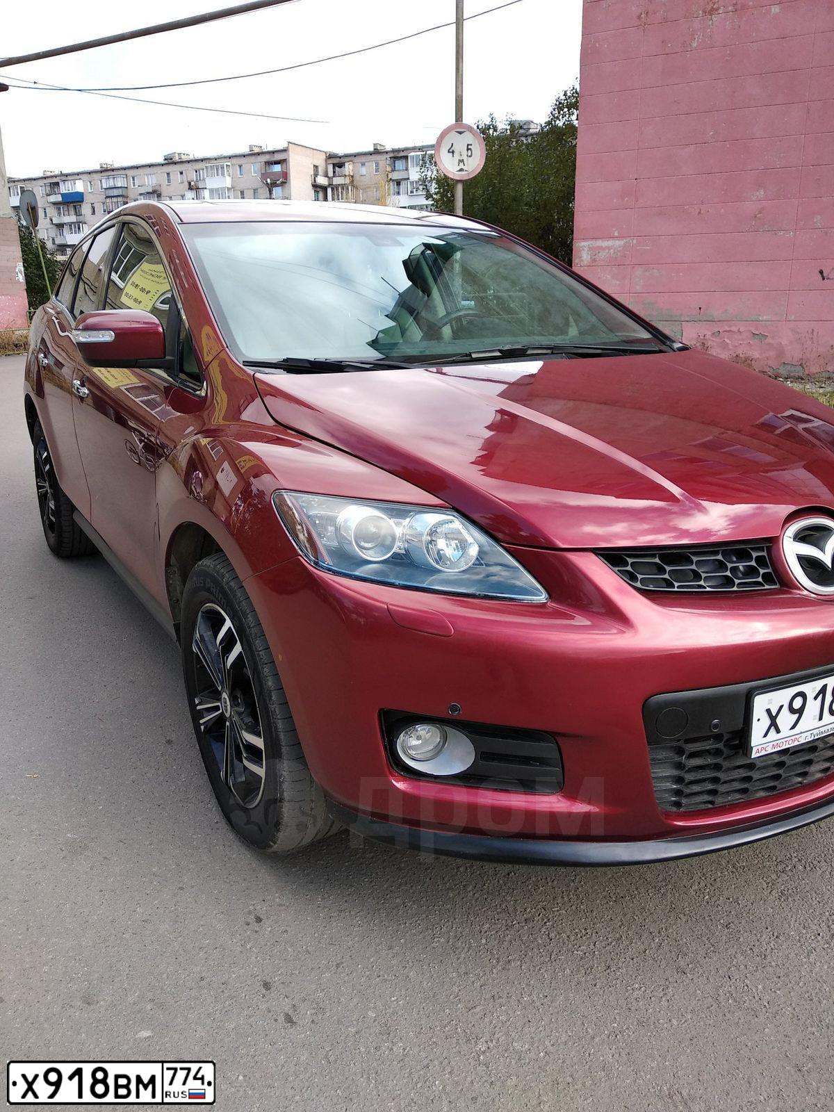 Фото автомобиля MAZDA CX-7, 2007 — госномер О033АЕ799. Цвет: Красный