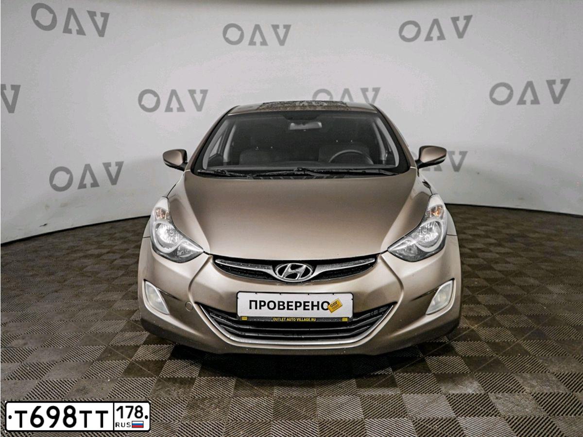 Фото автомобиля HYUNDAI ELANTRA, 2011 — госномер О626РТ29. Цвет: бронзовый