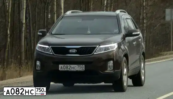 Фото автомобиля KIA SORENTO, 2016 — госномер О924УО29. Цвет: Коричневый