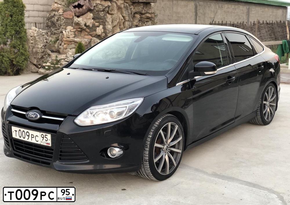 Фото автомобиля FORD FOCUS, 2012 — госномер Т009РС95. Цвет: СЕРЕБРИСТЫЙ