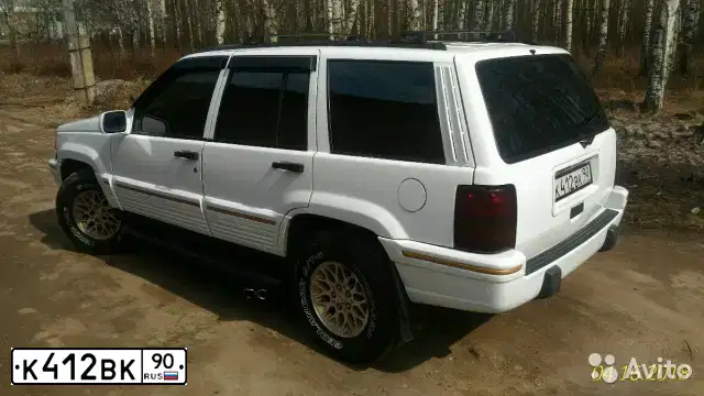 Фото автомобиля JEEP GRAND CHEROKEE, 1993 — госномер К412ВК90. Цвет: БЕЛЫЙ