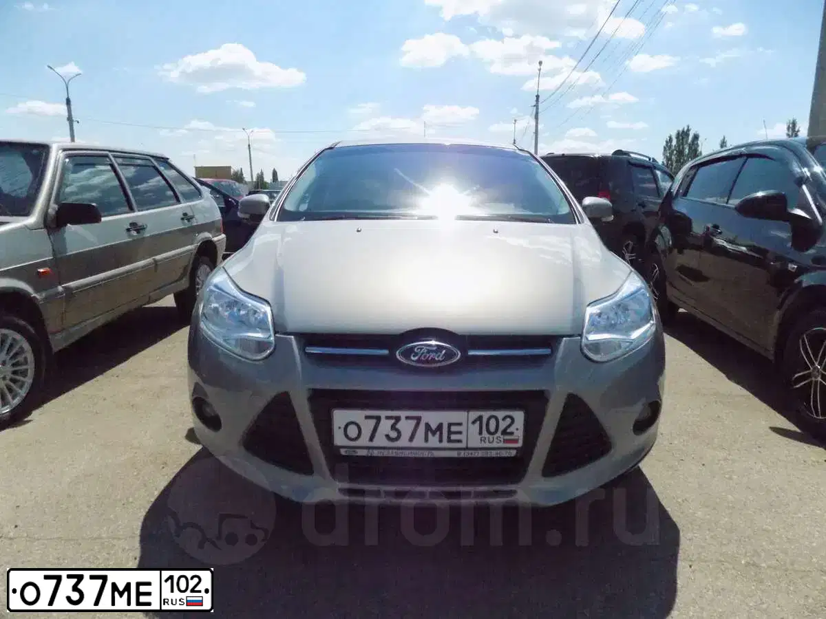 Фото автомобиля FORD FOCUS, 2011 — госномер Е943УС193. Цвет: СЕРО-ГОЛУБОЙ