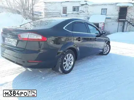 Фото автомобиля FORD MONDEO, 2012 — госномер К051ТХ174. Цвет: ЧЕРНЫЙ