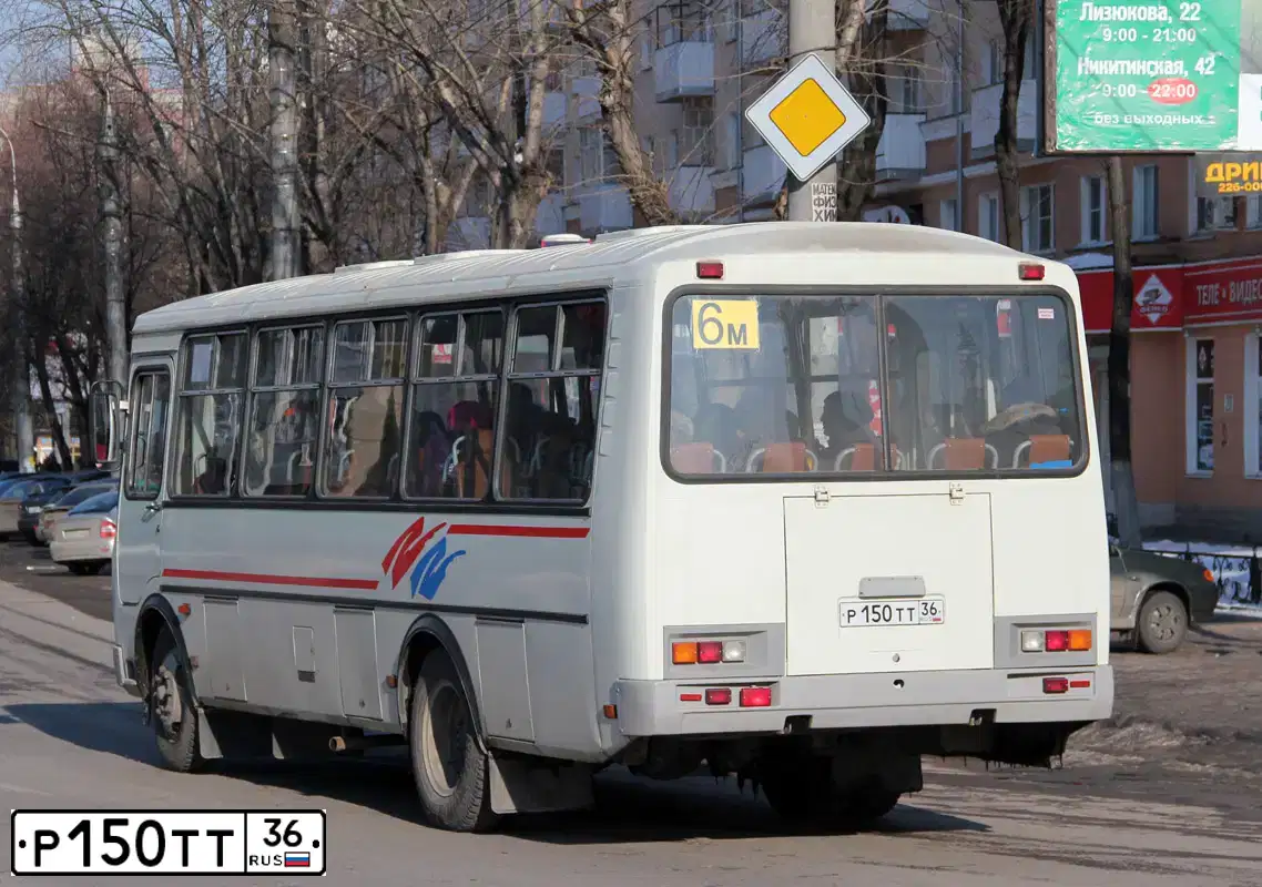 Фото автомобиля NISSAN ALMERA /AVTOVAZ/, 2014 — госномер Х073ХС36. Цвет: ЧЕРНЫЙ