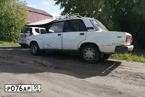 Фото автомобиля LADA 2107, 2004 — госномер Х884КВ55. Цвет: Белый