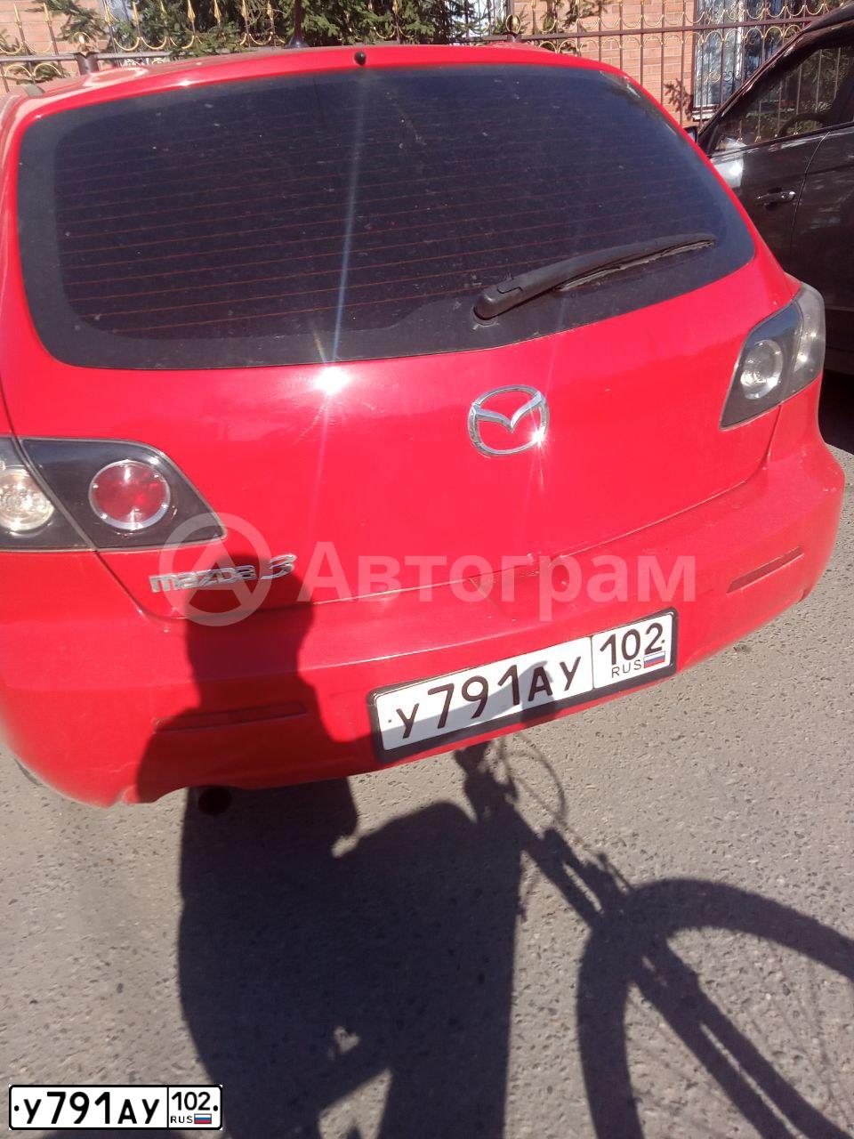 Фото автомобиля MAZDA 3, 2007 — госномер Х424ТН55. Цвет: Красный