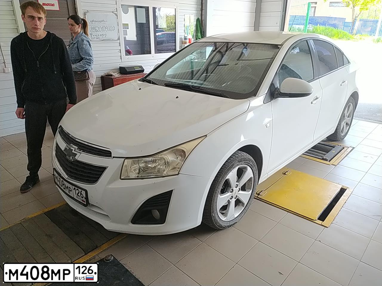 Фото автомобиля CHEVROLET CRUZE, 2012 — госномер А080УВ77. Цвет: Белый