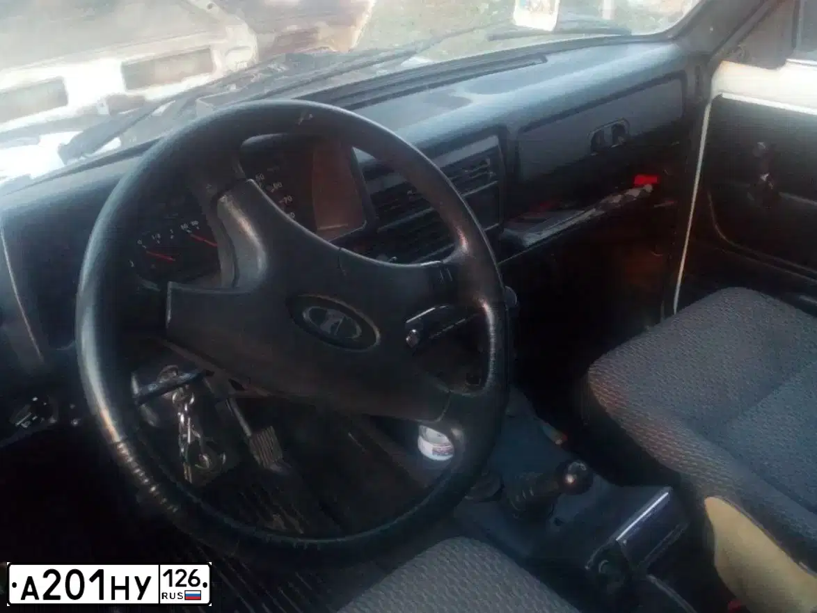Фото автомобиля LADA 2121 NIVA, 2001 — госномер А201НУ126. Цвет: Белый