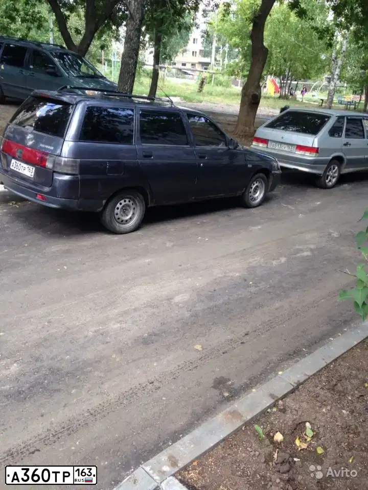 Фото автомобиля LADA 2111, 2001 — госномер М333КС164. Цвет: МНОГОЦВЕТНЫЙ