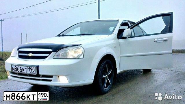 Фото автомобиля CHEVROLET LACETTI, 2010 — госномер Р183УЕ161. Цвет: БЕЛЫЙ