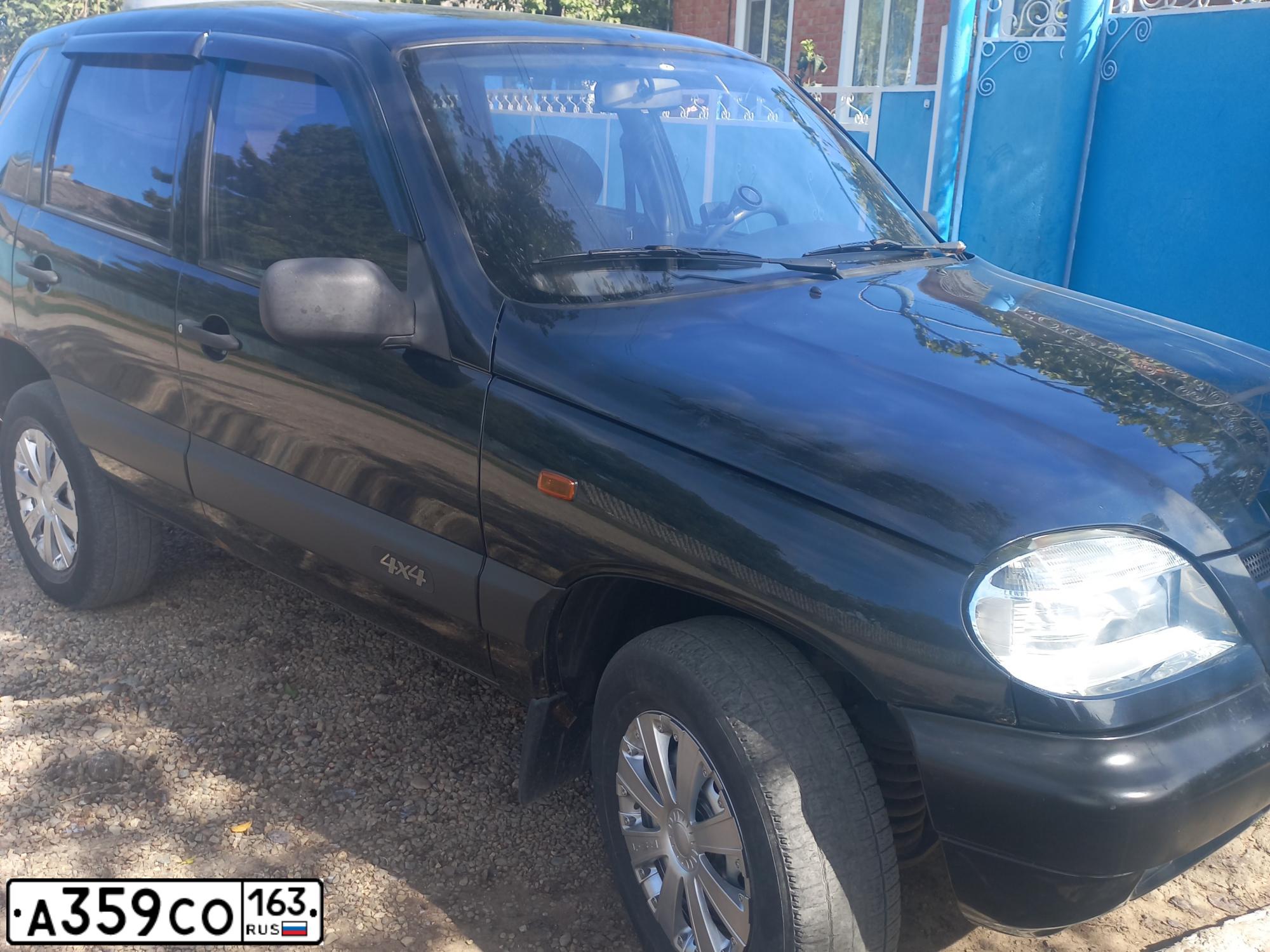 Фото автомобиля CHEVROLET NIVA, 2008 — госномер Т751МВ761. Цвет: ЧЕРНО-СИНИЙ