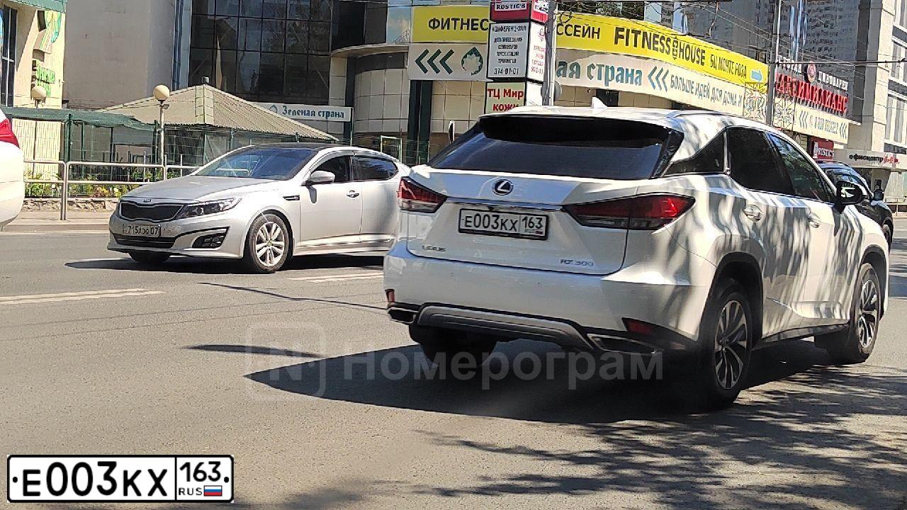 Фото автомобиля MITSUBISHI LANCER, 2011 — госномер Е003КХ163. Цвет: ЧЕРНЫЙ