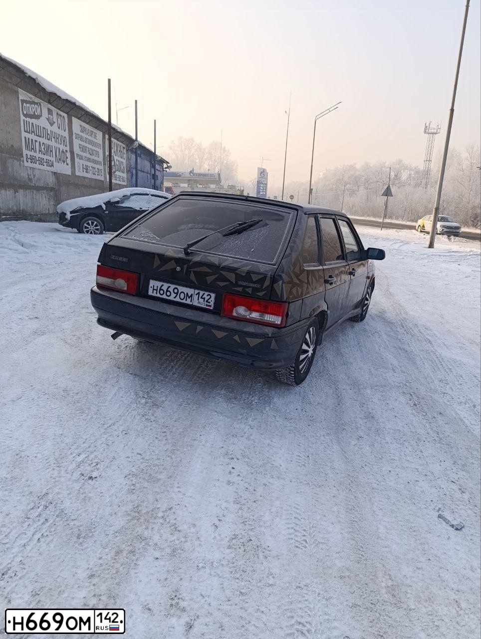 Фото автомобиля LADA 2114 SAMARA, 2009 — госномер Н669ОМ142. Цвет: ТЕМНО ЗЕЛЕНЫЙ