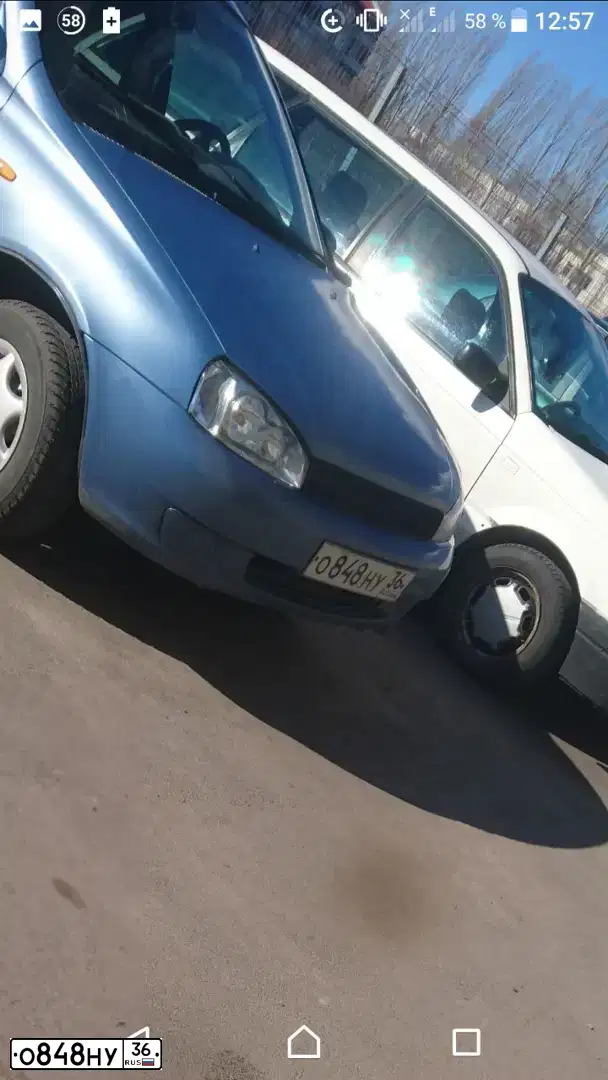 Фото автомобиля LADA 1118 KALINA, 2007 — госномер О848НУ36. Цвет: Серо-Синий