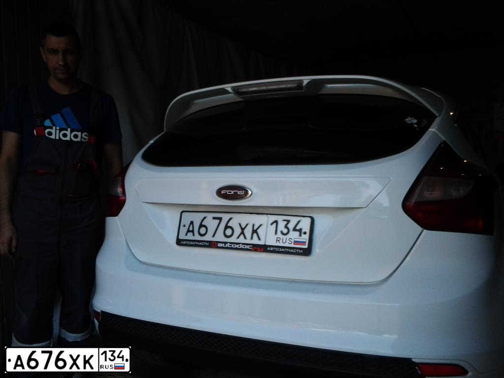 Фото автомобиля FORD FOCUS, 2013 — госномер Т890ОС58. Цвет: Белый