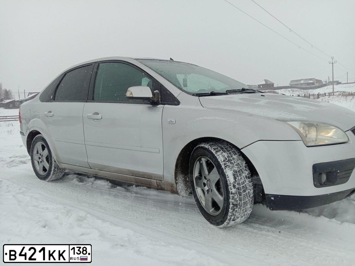 Фото автомобиля FORD FOCUS, 2006 — госномер Т521АУ59. Цвет: Серебристый