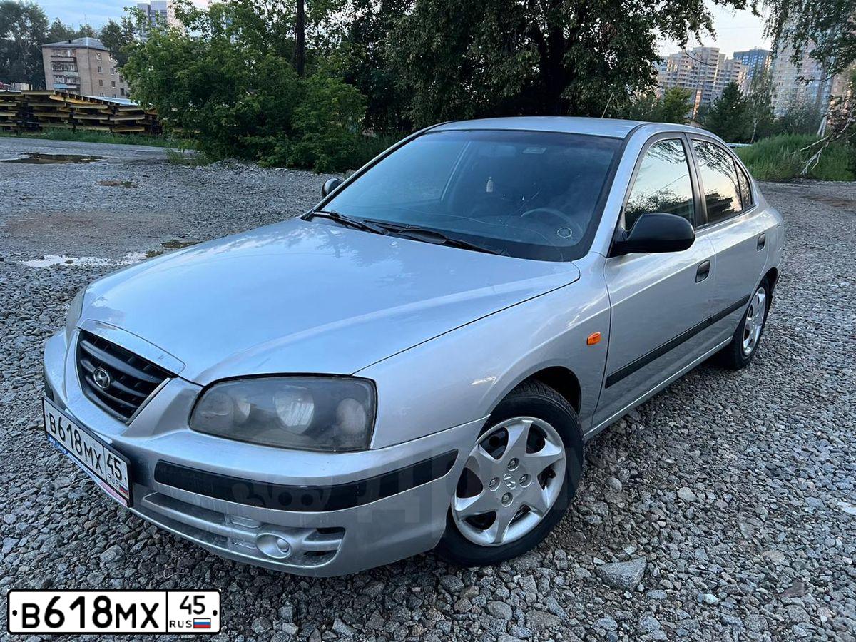 Фото автомобиля HYUNDAI ELANTRA, 2005 — госномер Н074ХЕ74. Цвет: Серебристый
