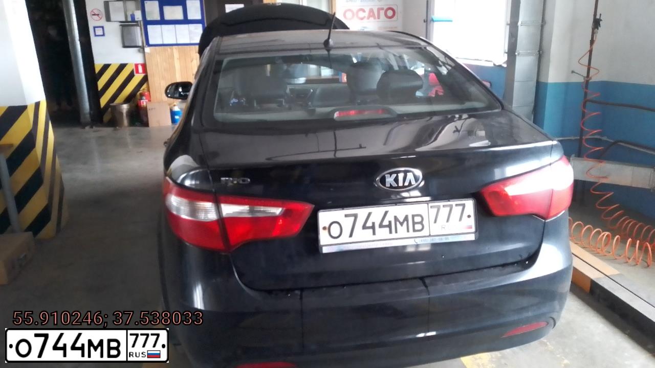 Фото автомобиля KIA RIO, 2014 — госномер О744МВ777. Цвет: ЧЕРНЫЙ