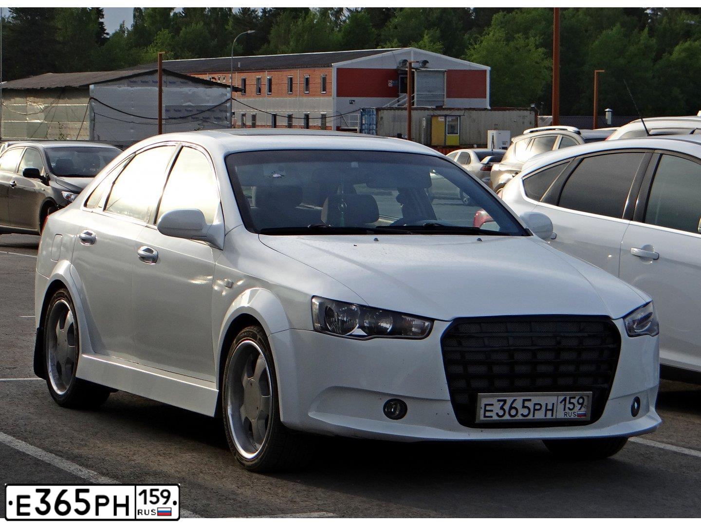 Фото автомобиля CHEVROLET LACETTI, 2006 — госномер Е365РН159. Цвет: Белый