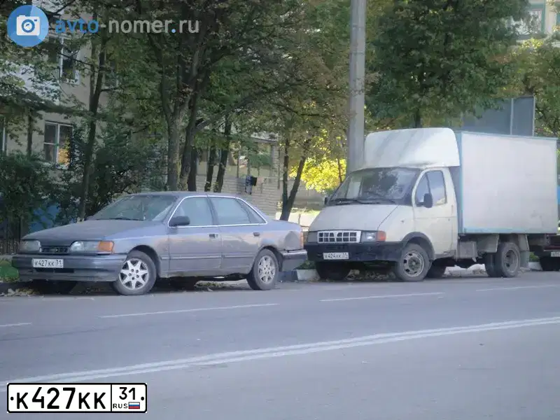 Фото автомобиля TOYOTA CAMRY, 2012 — госномер Е900ВЕ31. Цвет: СЕРЫЙ МЕТАЛЛИК
