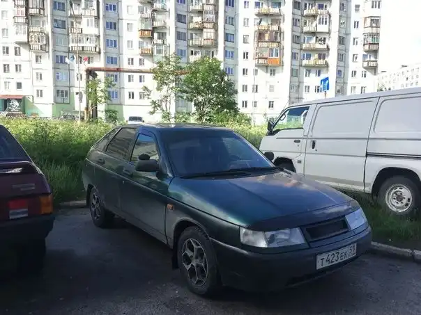 Фото автомобиля LADA 2112, 2003 — госномер М533МР21. Цвет: Темно-зеленый