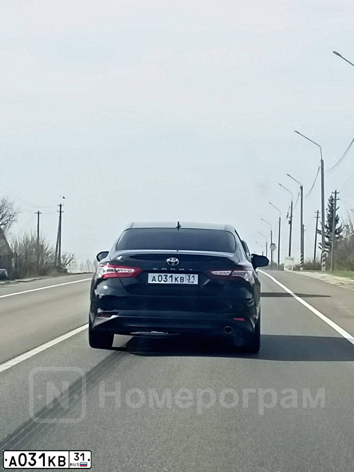 Фото автомобиля AUDI A8, 2012 — госномер А031КВ31. Цвет: ЧЕРНЫЙ