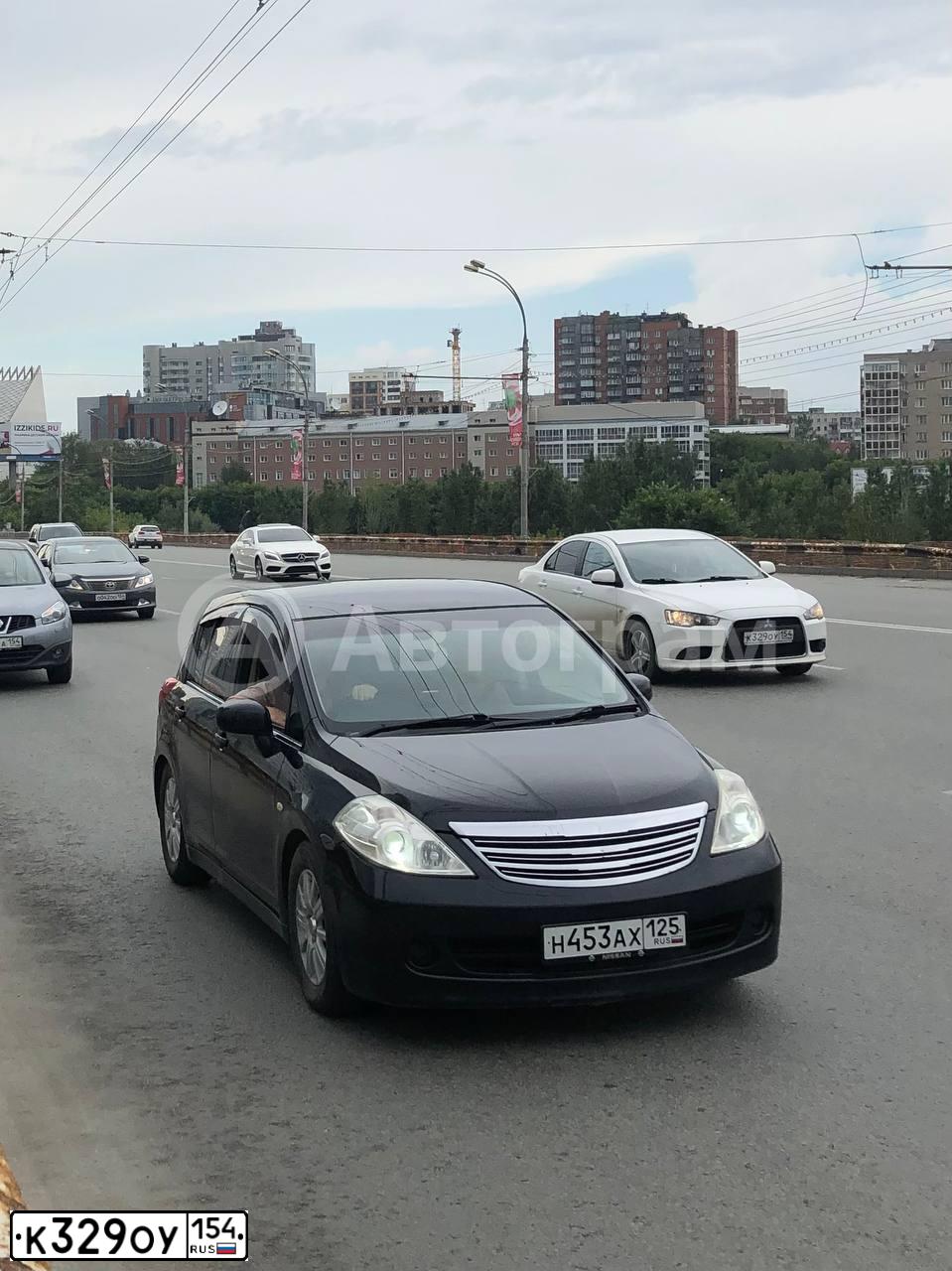 Фото автомобиля MITSUBISHI LANCER, 2013 — госномер К329ОУ154. Цвет: Белый