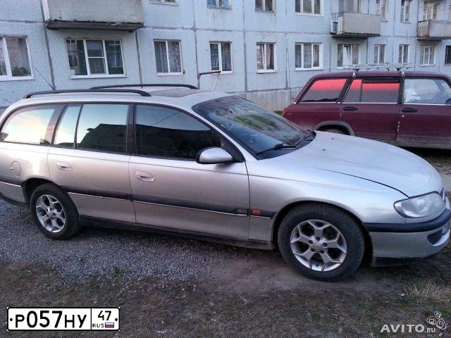 Фото автомобиля OPEL OMEGA, 1997 — госномер Р057НУ47. Цвет: СЕРЕБРИСТЫЙ
