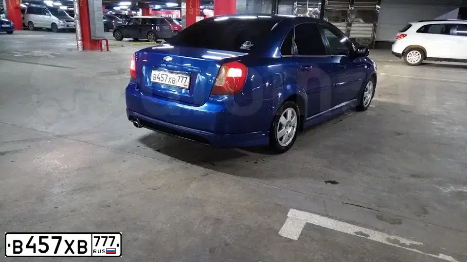Фото автомобиля CHEVROLET LACETTI, 2008 — госномер В457ХВ777. Цвет: СИНИЙ
