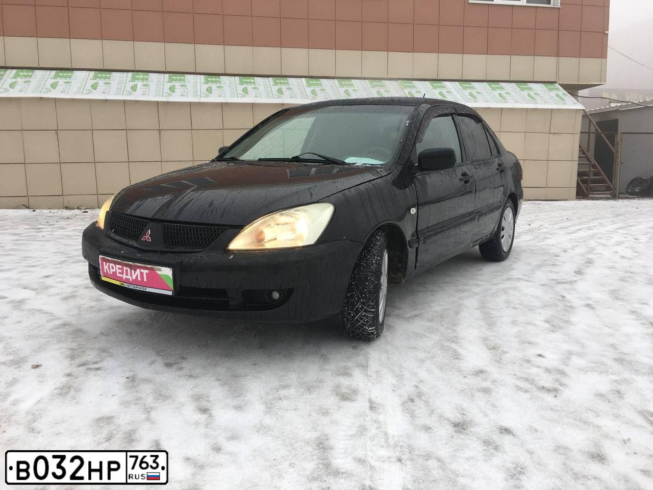 Фото автомобиля MITSUBISHI LANCER, 2006 — госномер В032НР763. Цвет: ЧЕРНЫЙ