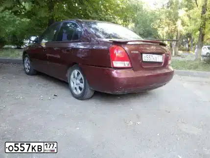 Фото автомобиля HYUNDAI ELANTRA, 2001 — госномер О356КС193. Цвет: ВИШНЕВЫЙ