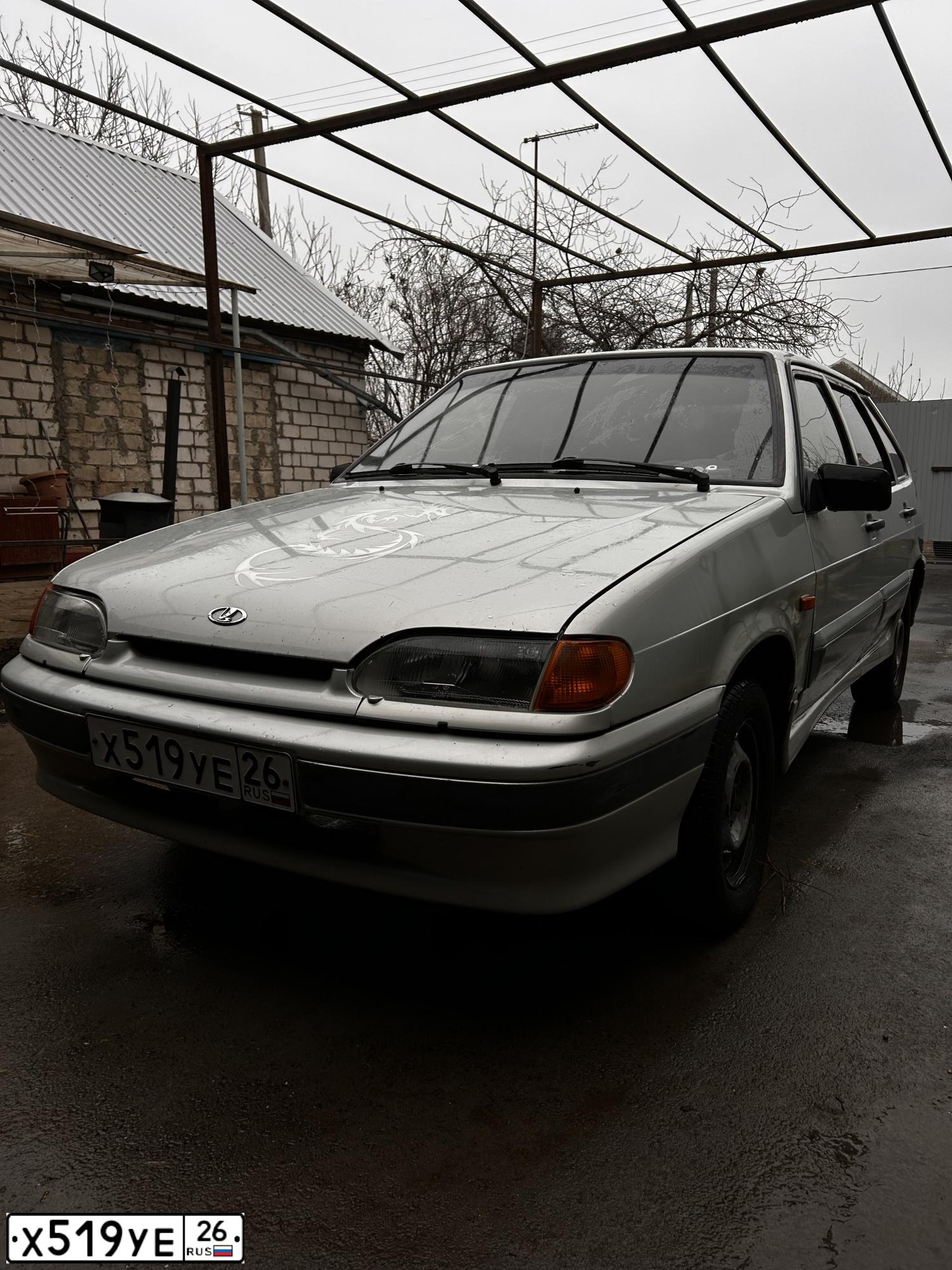 Фото автомобиля LADA 2114 SAMARA, 2004 — госномер Х519УЕ26. Цвет: МОЛОЧНО-БЕЛЫЙ СЕРЕБРИСТЫЙ