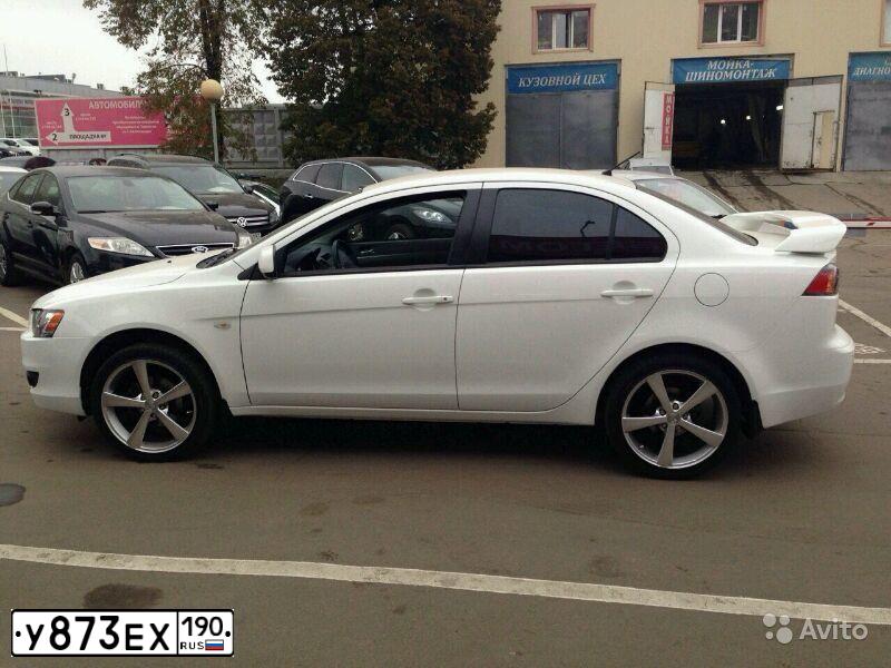 Фото автомобиля MITSUBISHI LANCER 1.5, 2010 — госномер О488ВА977. Цвет: Белый